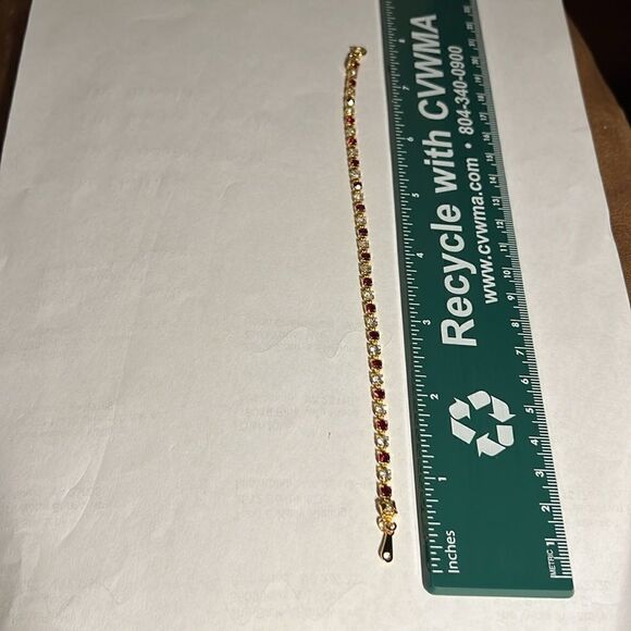 Ladies 8” faux Ruby/Diamond tennis bracelet. - Picture 5 of 5